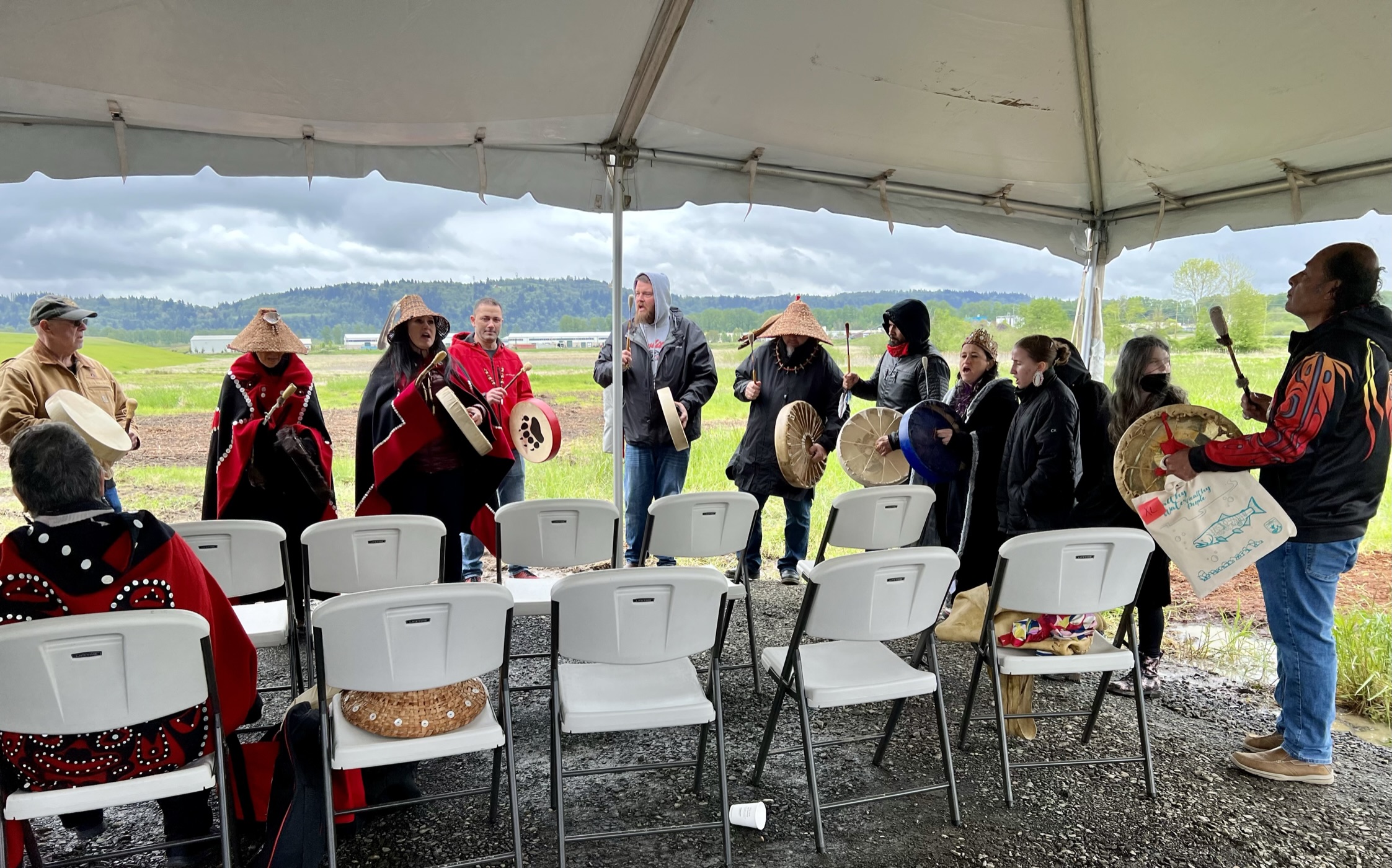 Cowlitz Indian Tribe drummers sharing a song