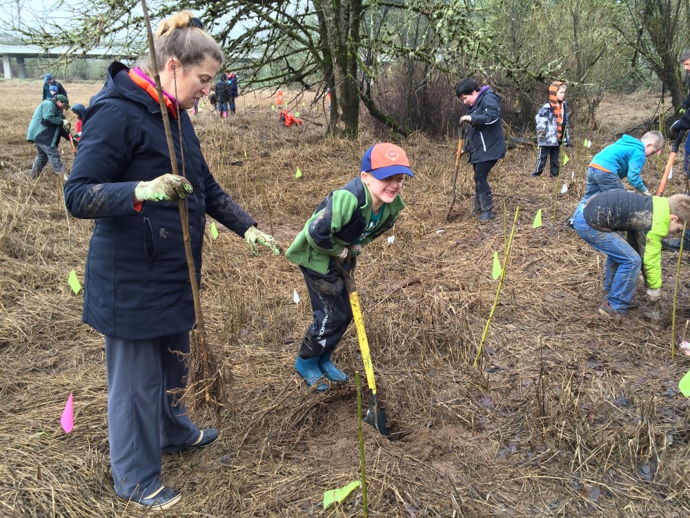 volunteers plant at La Center