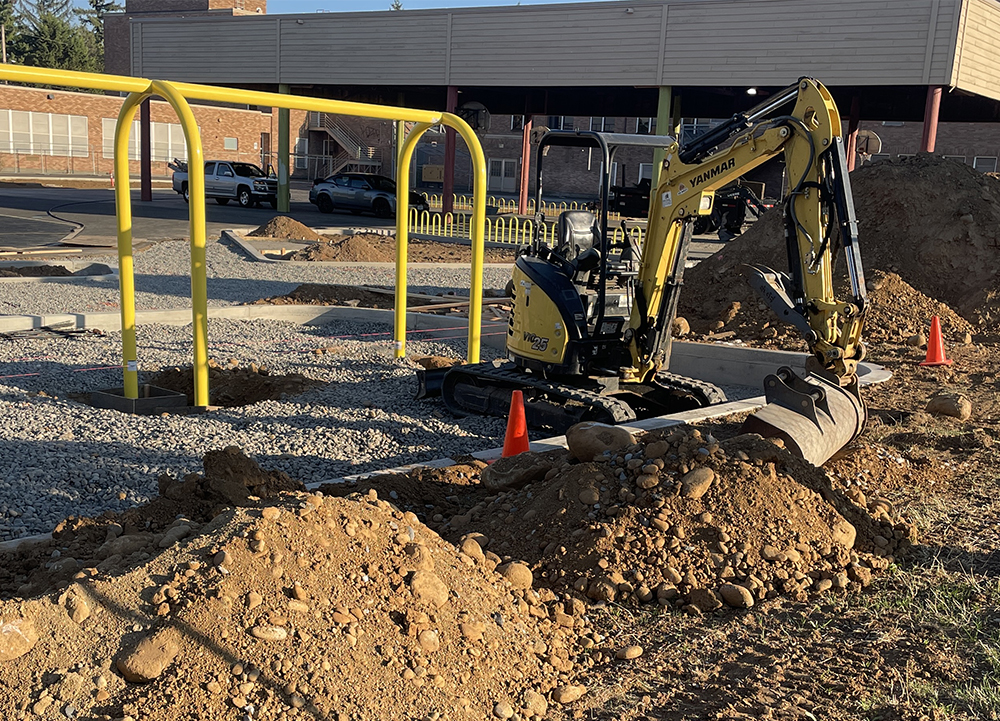 construction equipment in a playground area under construction
