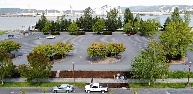 aerial shot of the parking lot shows the Columbia River in the background and new rain garden in the foreground