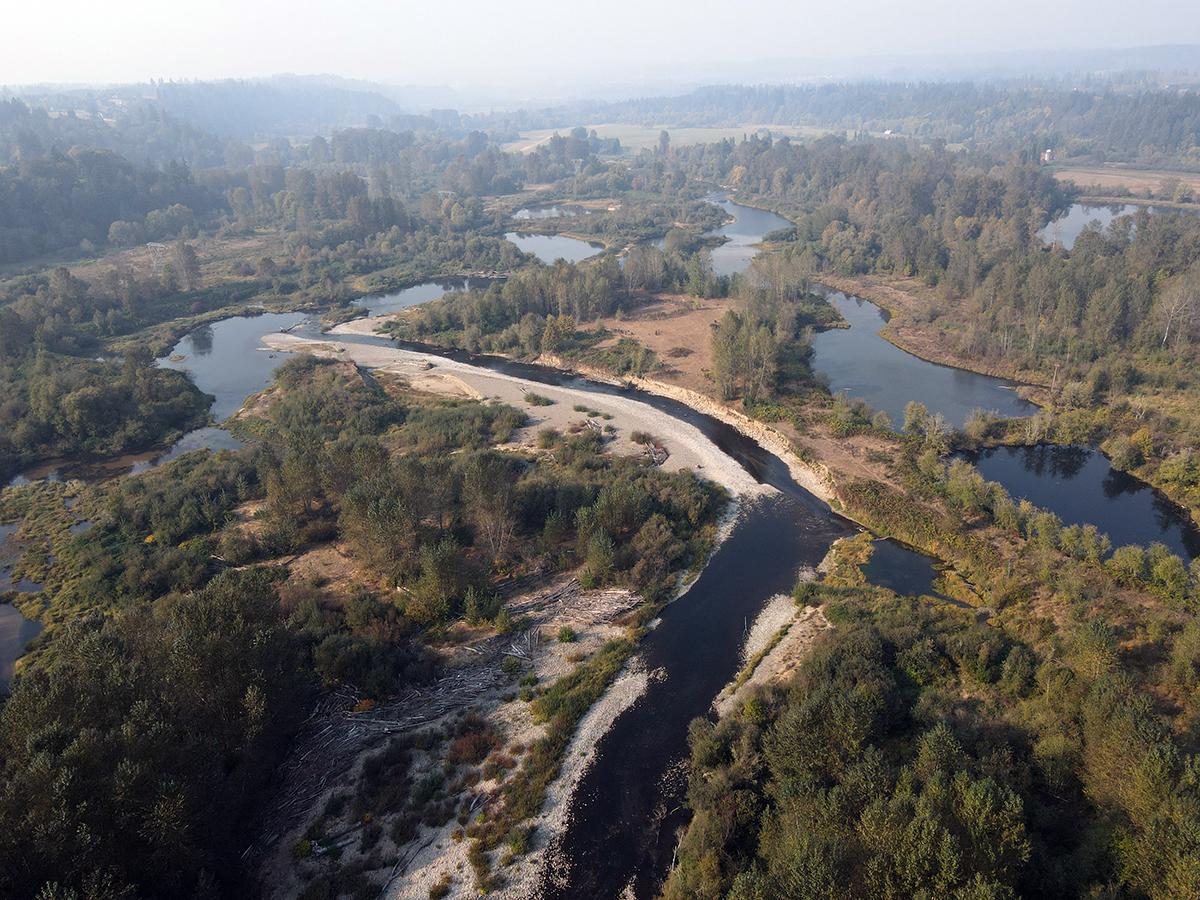 preconstruction East Fork Lewis River flows through gravel pits