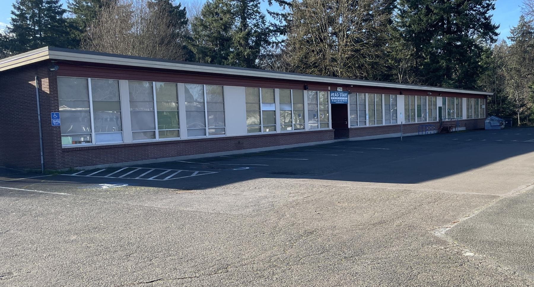 Creston Annex school with its paved parking lot
