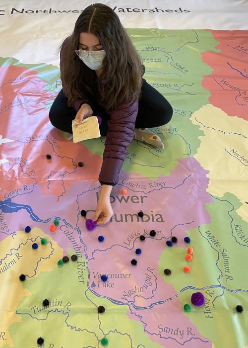 Students on watershed map