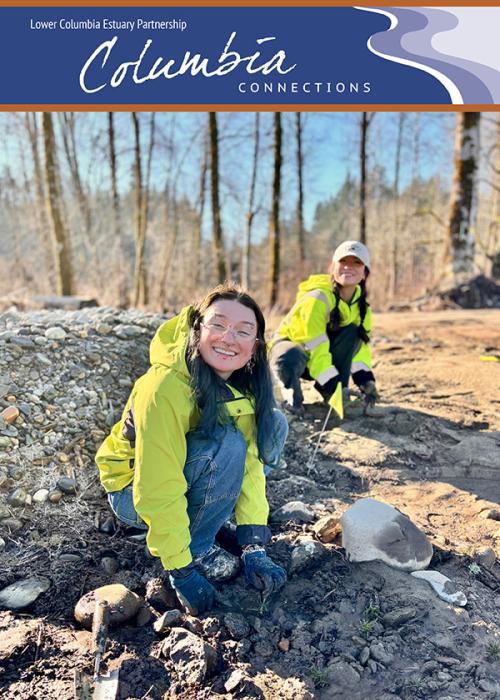 people kneeling to plant trees with smiles